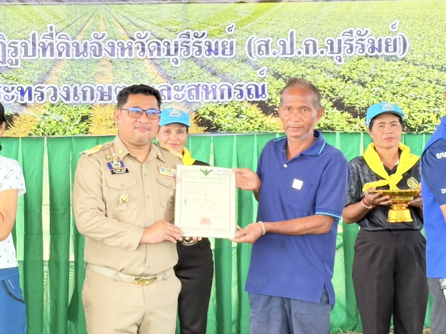 title - วันที่ 9 กุมภาพันธ์ 2569 ส.ป.ก.บุรีรัมย์ จัดกิจกรรมมอบโฉนดเพื่อการเกษตรพื้นที่อำเภอประโคนชัย จังหวัดบุรีรัมย์