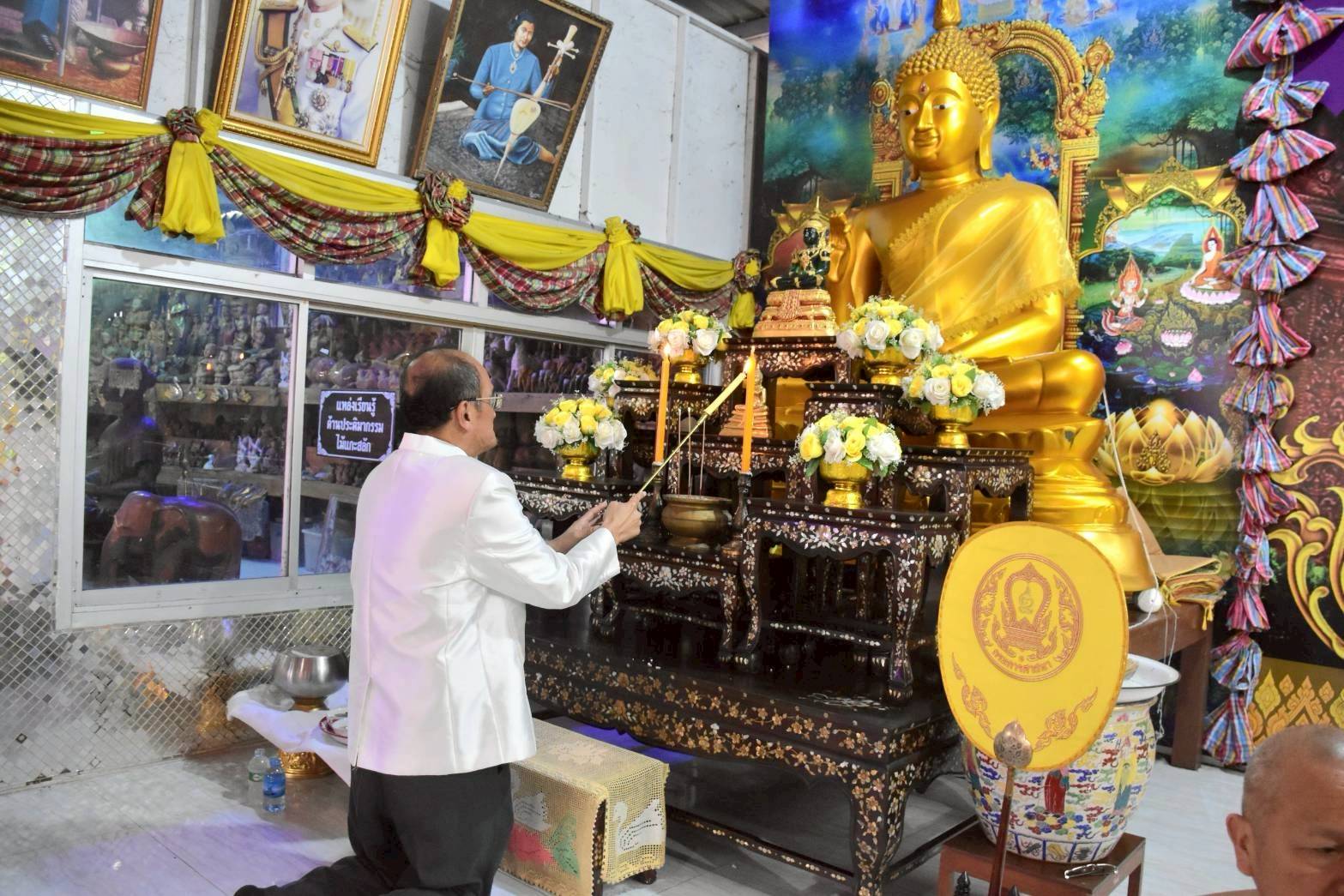 ส.ป.ก. ร่วมกิจกรรมทำบุญตักบาตร ยลวิถีลาวเวียง