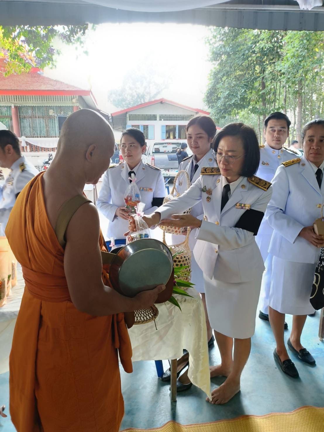 title - ส.ป.ก.นครนายก ร่วมเข้าร่วมพิธีเจริญพระพุทธมนต์ และทำบุญตักบาตร