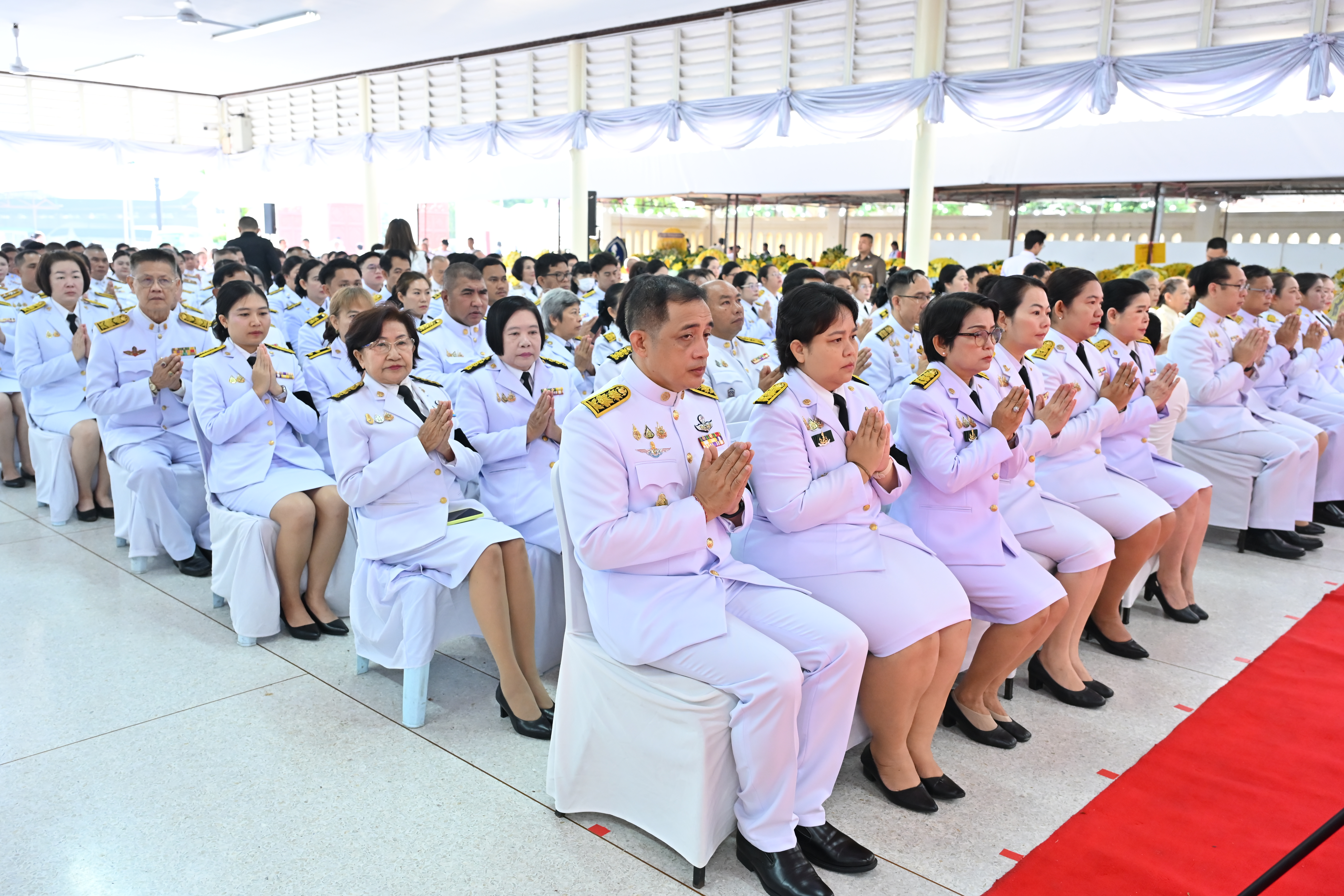title - พิธีสวดพระพุทธมนต์ พิธีทำบุญตักบาตร และพิธีวางพวงมาลา เนื่องในวันนวมินทรมหาราช ประจำปี 2569